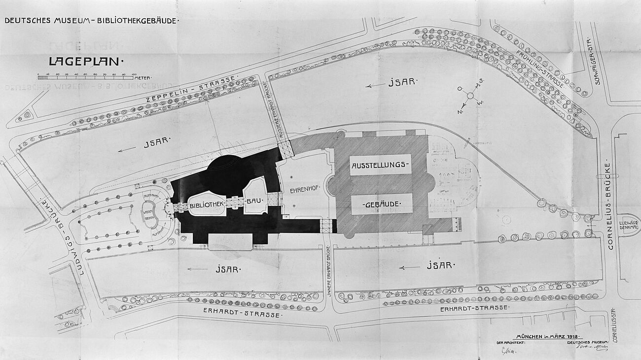 Lageplan/Grundriss des Deutschen Museums auf der Museumsinsel zwischen den zwei Armen der Isar. Bibliotheksbau schwarz eingefärbt und Ausstellungsgebäude grau straffiert.