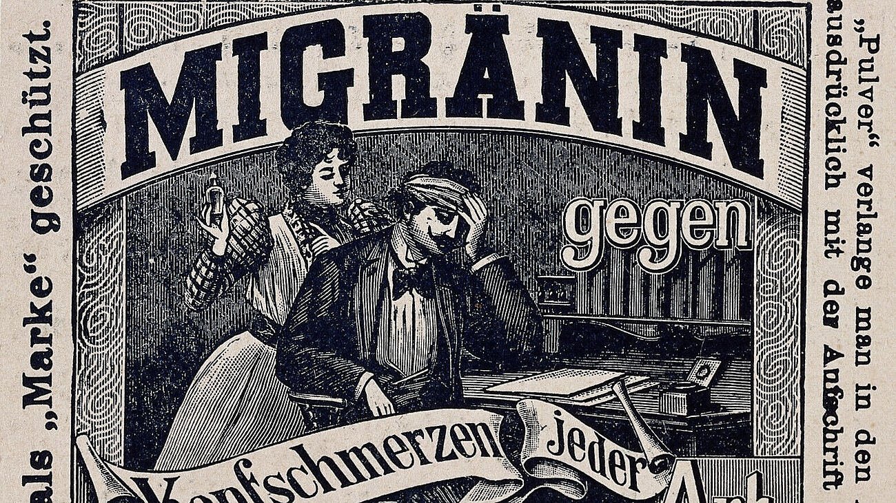 Zeitungswerbung. Zeichnung zeigt Mann mit Kopfschmerzen vor Schreibtisch, Frau hinter ihm stehend hält Fläschchen in der Hand. Migränin als Überschrift.